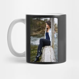 Woman tourist on a wooden bridge Mug